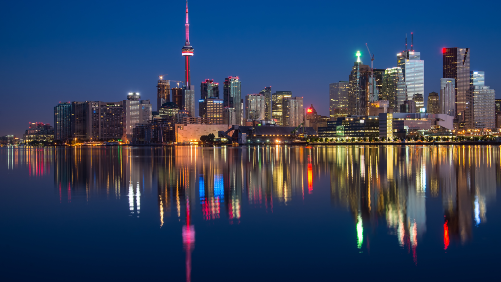 A panoramic shot of Toronto skyline at night.
